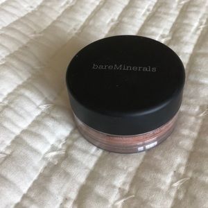 Bare radiance loose highlighting/blush powder